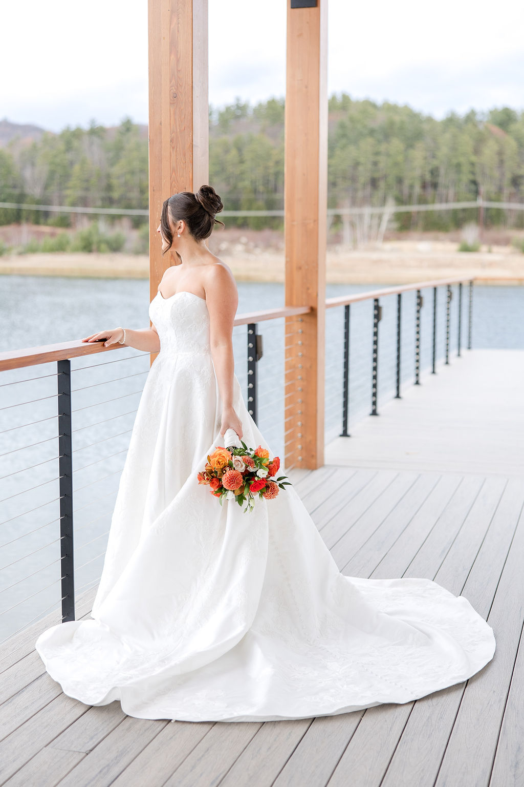 Vibrant, late fall wedding with oranges, rusts and dark blue.